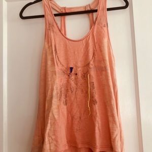 Free people orange tank with embroidery and detail
